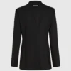 Blazer à revers contrastés et ceinture