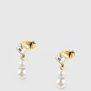 Boucles d’oreilles pendantes en perles de nacre Boucles d’oreilles pendantes en perles de nacre
