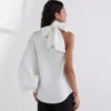 CHEMISE À MANCHE UNIQUE AVEC NOEUD CHEMISE À MANCHE UNIQUE AVEC NOEUD
