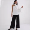 CHEMISE À MANCHE UNIQUE AVEC NOEUD CHEMISE À MANCHE UNIQUE AVEC NOEUD