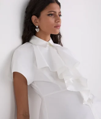 CHEMISE À MANCHES COURTES ET VOLANTS
