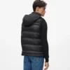 Gilet matelassé à capuche Gilet matelassé à capuche