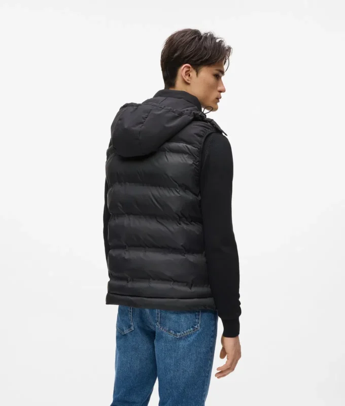 Gilet matelassé à capuche Gilet matelassé à capuche