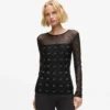Haut en maille avec autographe en strass Haut en maille avec autographe en strass