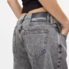 Jean taille moyenne à jambes évasées Jean taille moyenne à jambes évasées