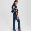 JEANS DROITS À TAILLE HAUTE ET OURLET FENDU JEANS DROITS À TAILLE HAUTE ET OURLET FENDU