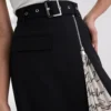 JUPE À PLIS JUPE À PLIS