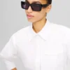 LUNETTES DE SOLEIL SIGNÉES À DÉCOUPES LUNETTES DE SOLEIL SIGNÉES À DÉCOUPES