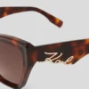 LUNETTES DE SOLEIL SIGNÉES À DÉCOUPES LUNETTES DE SOLEIL SIGNÉES À DÉCOUPES