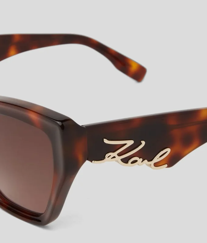 LUNETTES DE SOLEIL SIGNÉES À DÉCOUPES LUNETTES DE SOLEIL SIGNÉES À DÉCOUPES