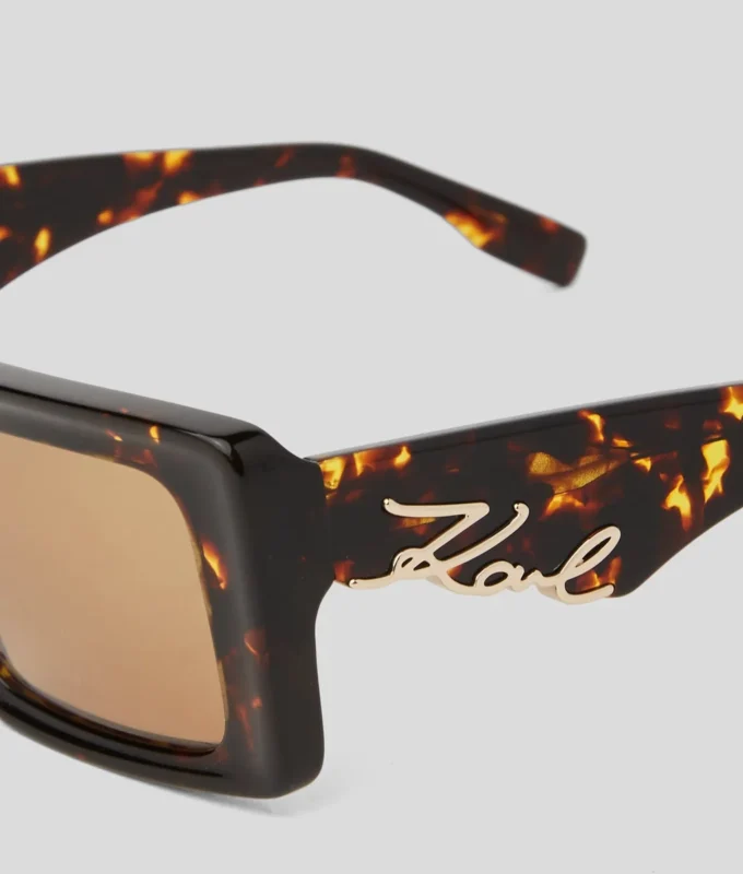 LUNETTES DE SOLEIL SIGNÉES À DÉCOUPES LUNETTES DE SOLEIL SIGNÉES À DÉCOUPES