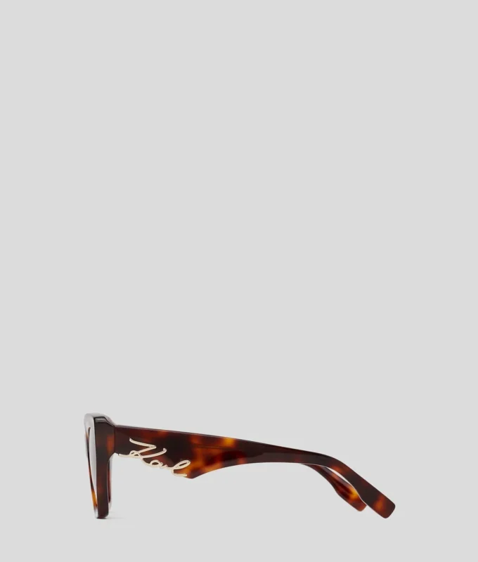 LUNETTES DE SOLEIL SIGNÉES À DÉCOUPES LUNETTES DE SOLEIL SIGNÉES À DÉCOUPES