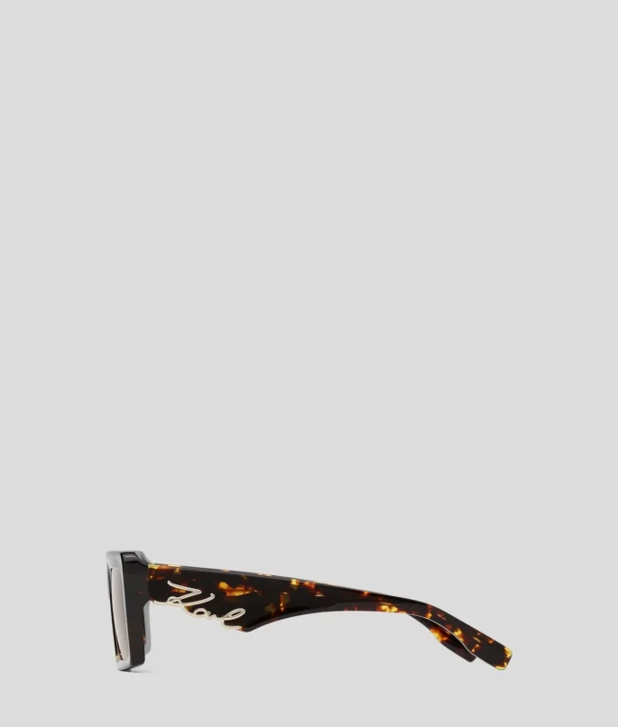 LUNETTES DE SOLEIL SIGNÉES À DÉCOUPES LUNETTES DE SOLEIL SIGNÉES À DÉCOUPES