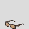 LUNETTES DE SOLEIL SIGNÉES À DÉCOUPES LUNETTES DE SOLEIL SIGNÉES À DÉCOUPES
