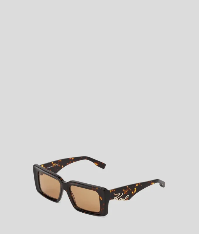 LUNETTES DE SOLEIL SIGNÉES À DÉCOUPES LUNETTES DE SOLEIL SIGNÉES À DÉCOUPES