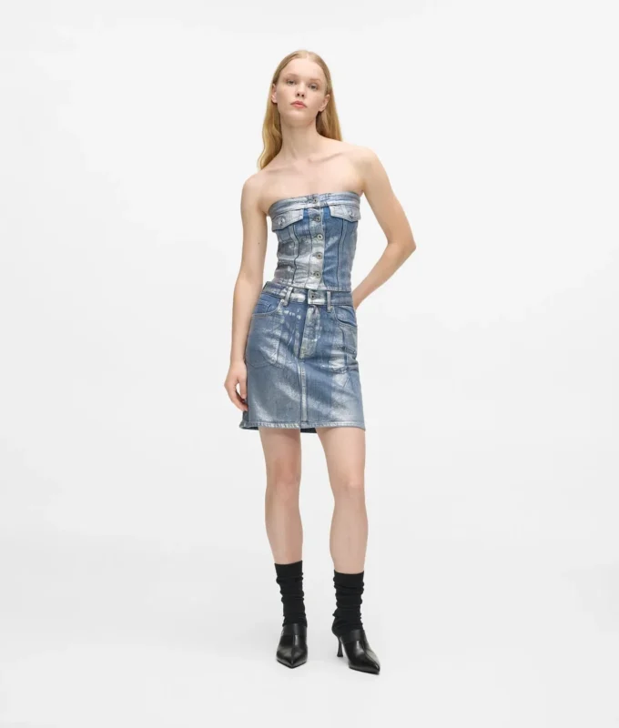 Mini-jupe en denim enduit Mini-jupe en denim enduit