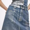 Mini-jupe en denim enduit Mini-jupe en denim enduit