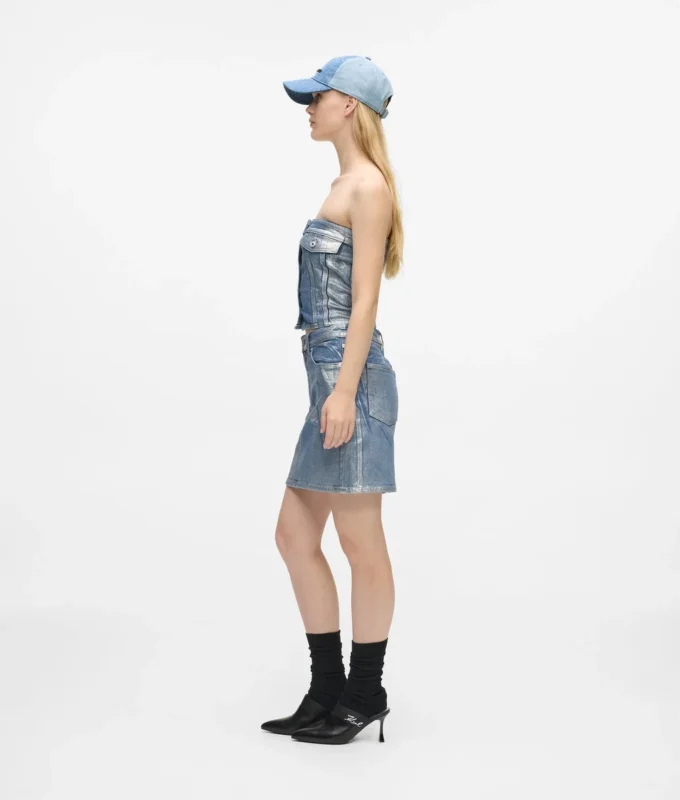 Mini-jupe en denim enduit Mini-jupe en denim enduit