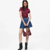 Mini-jupe plissée en denim Mini-jupe plissée en denim