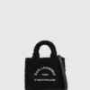 Mini sac fourre-tout en peau lainée Rue St-Guillaume Mini sac fourre-tout en peau lainée Rue St-Guillaume