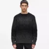 Pull en maille torsadée Pull en maille torsadée