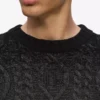 Pull en maille torsadée Pull en maille torsadée