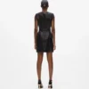Robe en cuir avec boutons Robe en cuir avec boutons