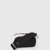 Sac à bandoulière pour appareil photo en peau lainée