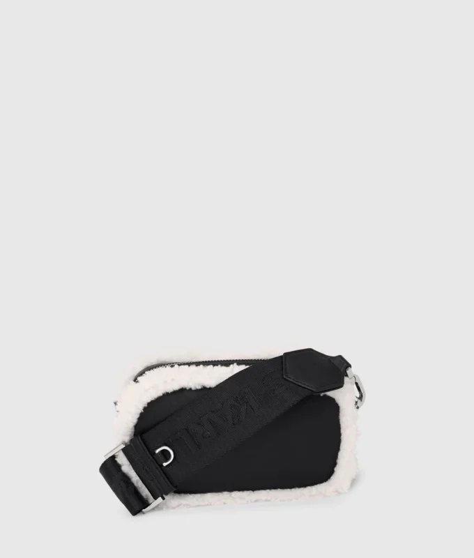 Sac à bandoulière pour appareil photo en peau lainée