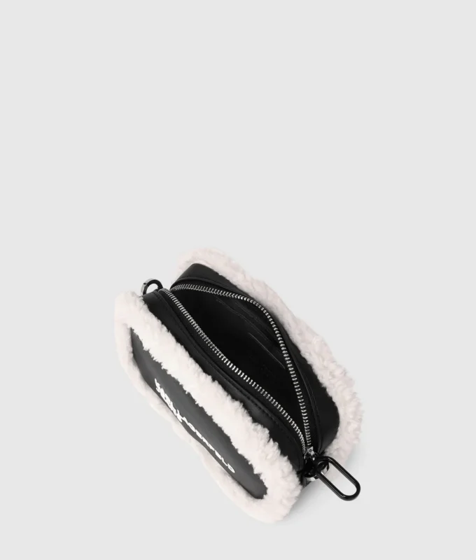Sac à bandoulière pour appareil photo en peau lainée