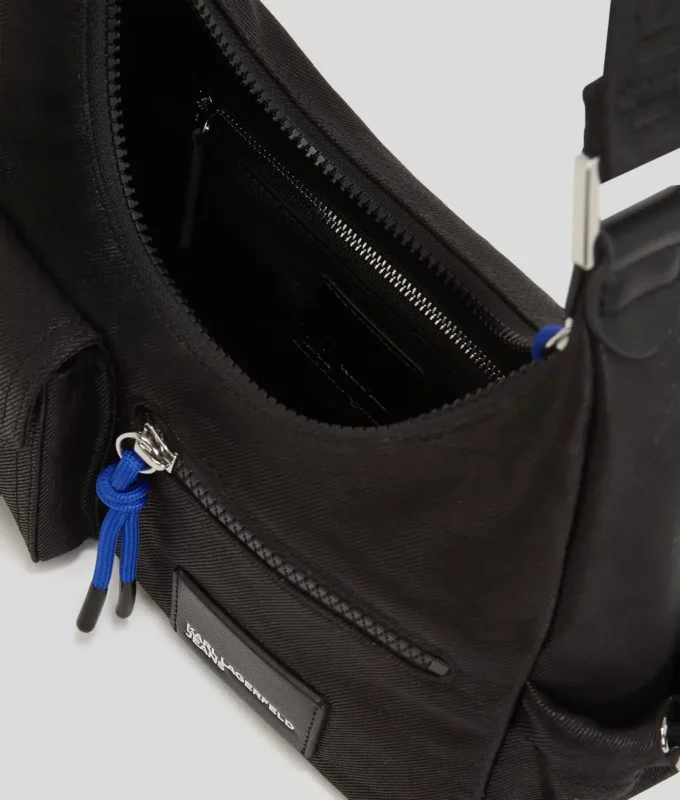 SAC À BANDOULIÈRE UTILITAIRE EN DENIM ENDUIT SAC À BANDOULIÈRE UTILITAIRE EN DENIM ENDUIT