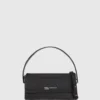 Sac à poignée supérieure avec logo métallique Sac à poignée supérieure avec logo métallique