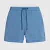 SHORT DE BAIN COURT AVEC LOGO MÉTALLIQUE SHORT DE BAIN COURT AVEC LOGO MÉTALLIQUE