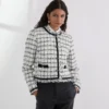 VESTE EN BOUCLÉ VESTE EN BOUCLÉ